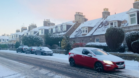 Snow on residential street in Aberdeen