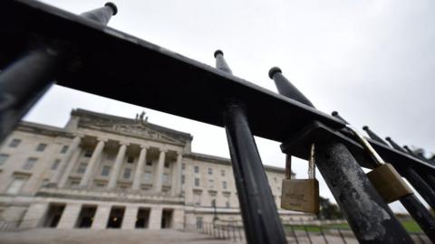 Front of Stormont showing padlock over the gates