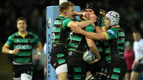 Northampton Saints celebrate a try against Saracens on 29 March 2024