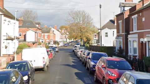 Parked cars on Henry Road in Kingsholm