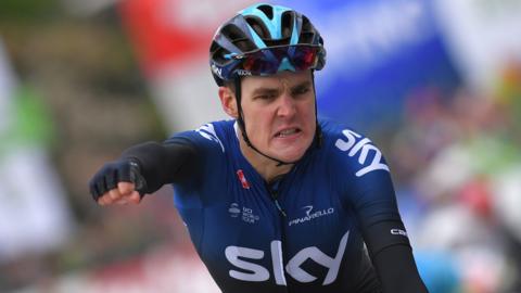 Team Sky's Pavel Sivakov punches the air in celebration after winning stage two of the Tour of the Alps