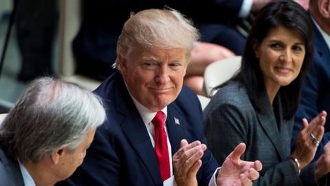 US President Donald Trump (2L), US Ambassador to the UN Nikki Haley (C), White House Chief of Staff John Kelly (2R) and National Security Advisor H. R. McMaster (R) clap for UN Secretary-General Antonio Guterres (L) a meeting on United Nations Reform at the UN headquarters in New York on September 18, 2017