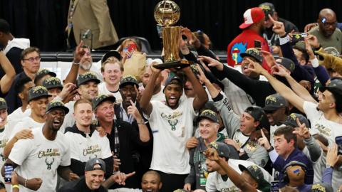 Milwaukee Bucks lift NBA trophy