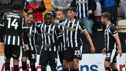 Notts County celebrate Matt Dennis' opener against Shrewsbury Town