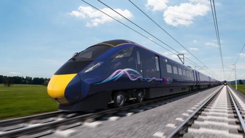 A Hull Trains service on the rails. The train is dark blue with a yellow nose cone and a swirling pattern and Hull Trains logo on the side.