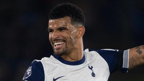 Dominic Solanke smiles on his debut for Tottenham against Leicester