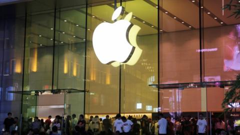 Customers are experiencing the newly launched iPhone 15 at Apple's flagship store in Shanghai, China, on September 24, 2023.