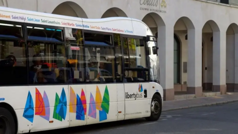 A LibertyBus parked outside Coutts.