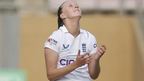 England bowler Lauren Filer looks frustrated while bowling against India