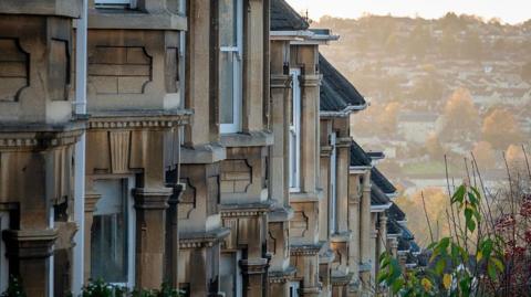 A GV of a row of houses on a UK street