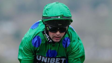 Nico de Boinville with green silks on