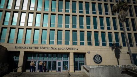 US Marines stand outside the Embassy of the United State of America in Havana, on February 21, 2018