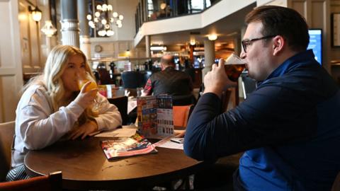 Drinkers at Northwestern pub in Liverpool on 17 May 2021