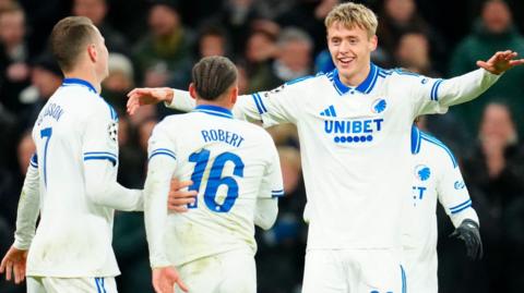 FC Copenhagen's Icelandic forward Viktor Dadason celebrates with team-mates after scoring the opening goal against Kairat. 