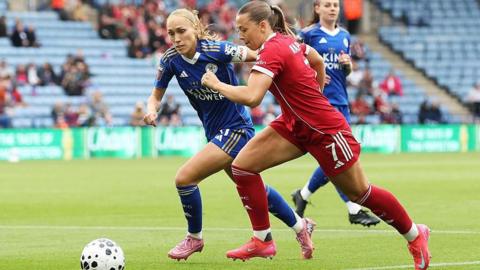 Cornelia Kapocs of Liverpool battles for possession with Janice Cayman of Leicester City 