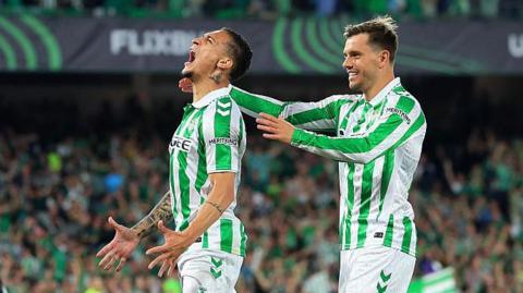 Antony celebrates his goal v Fiorentina with a team-mate