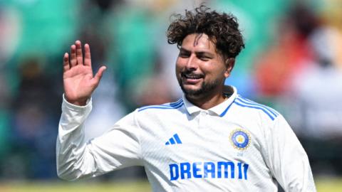 India spinner Kuldeep Yadav celebrates taking a wicket