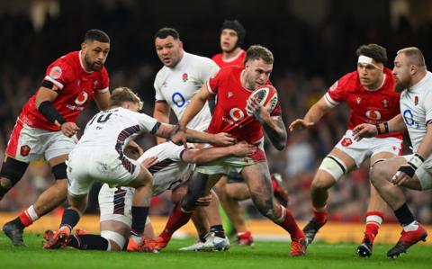 Max Llewellyn of Wales breaks with the ball against England in the 2025 Six Nations
