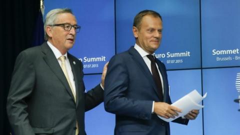 European Council President Donald Tusk (R) and European Commission President Jean-Claude Juncker