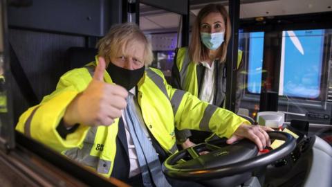 Boris Johnson during a visit to the National Express depot in Coventry