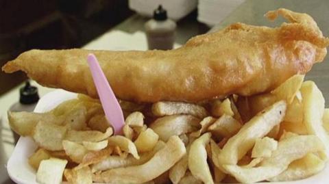 Fish and chips in a polystyrene tray