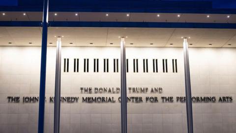 A close up of signage that says The Donald J Trump and John F Kennedy Memorial Center for the Performing Arts on 16 May 2026 in Washington DC. 