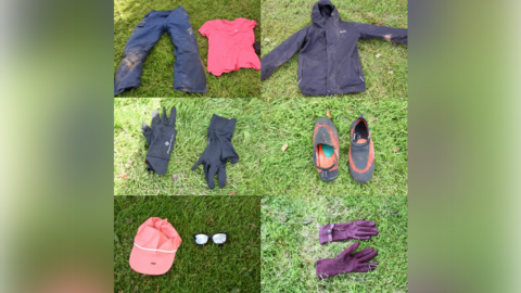 A pair of muddy cargo trousers lain on grass alongside a pink sports top on. There is also a black hooded waterproof jacket. There's a collage of other pictures including black gloves, trainers, a red cap and sunglasses and purple leather gloves. 