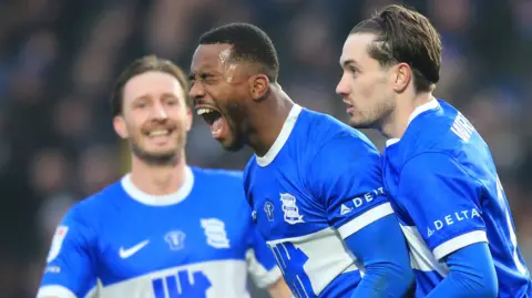 Ethan Laird celebrates scoring Birmingham's winner against Exeter