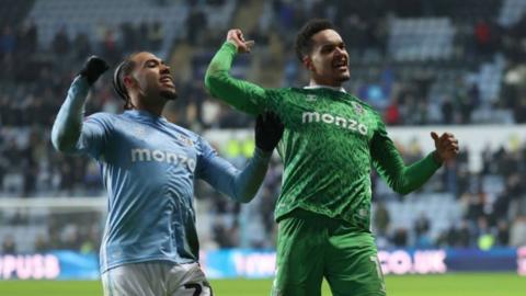 Milan van Ewijk and Oliver Dovin of Coventry City celebrate their team's FA Cup win