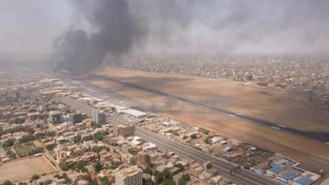 Smoke rises of Khartoum