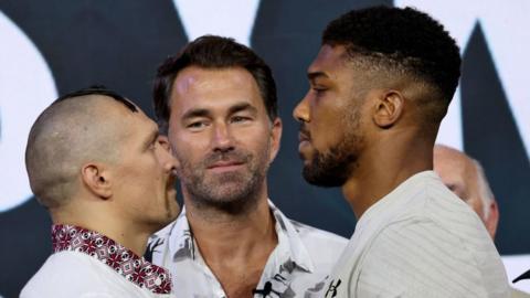 Oleksandr Usyk and Anthony Joshua face off at weigh in