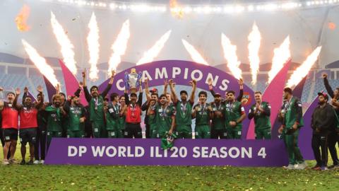 ILT20 winners Desert Vipers celebrate with trophy