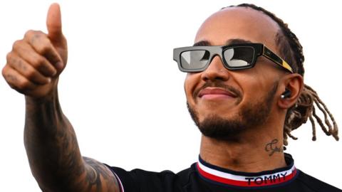 Sir Lewis Hamilton making a thumbs-up gesture