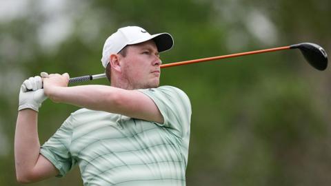 Robert MacIntyre plays a shot