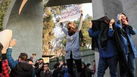 Iranian students clash with riot police during an anti-government protest around the University of Tehran, Iran, 30 December 2017.