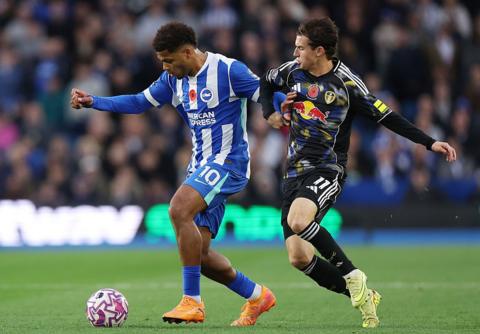 Brighton v Leeds in Premier League - players contest a ball