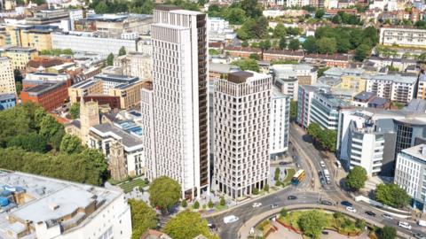 A view of a tower block in a cityscape