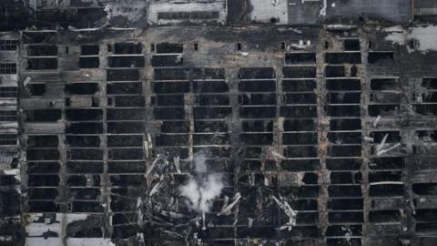 Aerial view of a destroyed DIY hypermarket in Kharkiv on 26 May, 2024