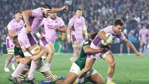 Ben White reaches for the line to score Scotland's fourth try in Pretoria