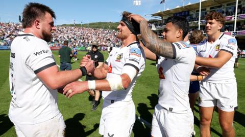 Exeter players celebrate reaching the Prem final