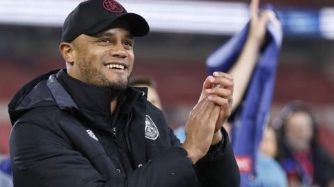 Vincent Kompany claps the Burnley fans after he guided the club to promotion back to the Premier League