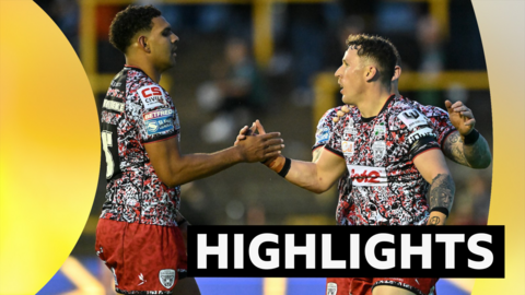 Leigh's Adam Cook celebrates scoring a try against Castleford