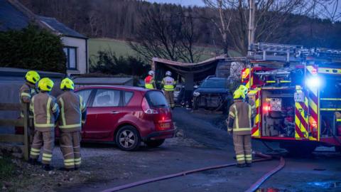 Fire crews attending a fire at a house in Rothienorman, Aberdeenshire.
