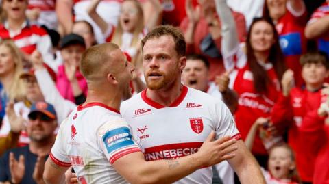 Hull KR's Mikey Lewis and Joe Burgess celebrate together against Warrington