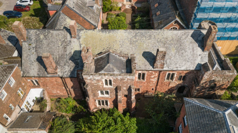 The roof of Exeter’s oldest building, a medieval priory turned Tudor townhouse, needs urgent repairs. 
