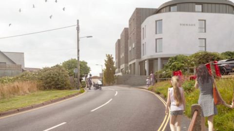 Artist impression of the proposed St Ives Premier Inn. There is a white and grey building on the corner at the right and two people walking towards the hotel. On the left there is grass, trees and hedges. There is a person pushing a pushchair across the road at the centre