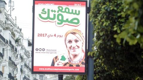 A poster in Algiers urging people to vote