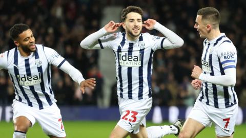 Mikey Johnstone (centre) celebrates his goal for West Brom with team-mates