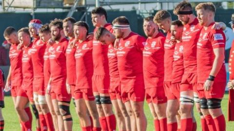 Jersey Reds line up before a match