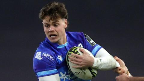 Jack Walsh attacks for Ospreys